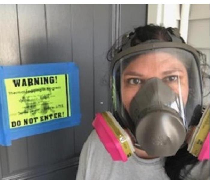 Pathogen Fogging - image of employee in PPE