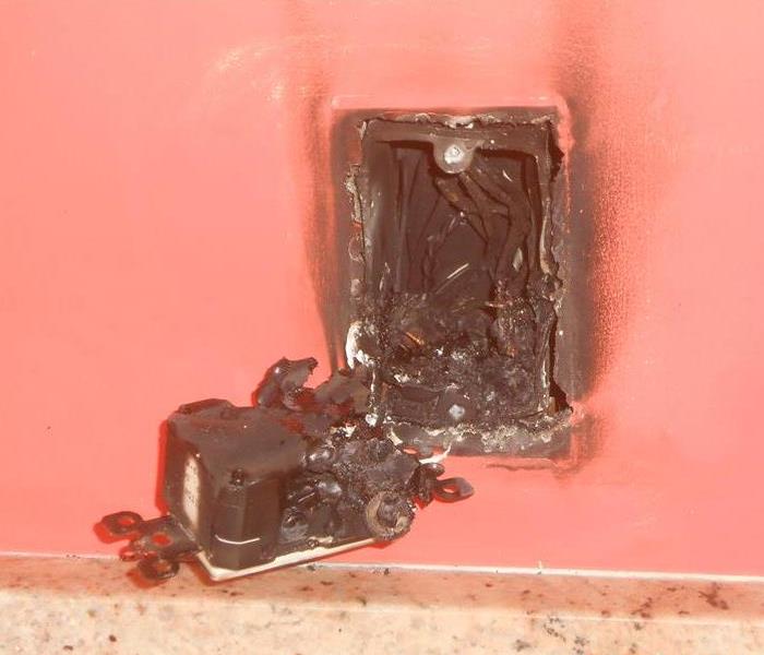 Burnt electrical outlet in a kitchen